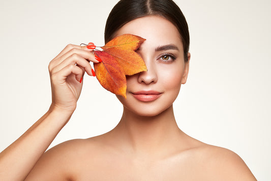 Autumn portrait of beautiful woman with clean fresh skin